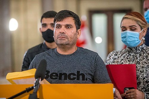 MIKAELA MACKENZIE / WINNIPEG FREE PRESS

Mushtaqu Rahman speaks about the Afghanistan refugee crisis with his family at the Manitoba Legislative Building in Winnipeg on Tuesday, Aug. 24, 2021. For --- story.
Winnipeg Free Press 2021.