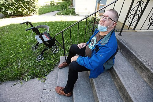 JOHN WOODS / WINNIPEG FREE PRESS
Mark Olfert, was living in a Main Street hotel until it was damaged by fire, is photographed outside his friends home where he is staying until he can get his own place in Winnipeg Thursday, August 25, 2021. 

Reporter: Robertson