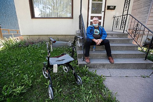 JOHN WOODS / WINNIPEG FREE PRESS
Mark Olfert, was living in a Main Street hotel until it was damaged by fire, is photographed outside his friends home where he is staying until he can get his own place in Winnipeg Thursday, August 25, 2021. 

Reporter: Robertson