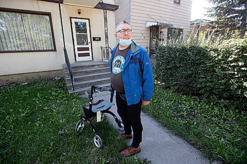 JOHN WOODS / WINNIPEG FREE PRESS
Mark Olfert, was living in a Main Street hotel until it was damaged by fire, is photographed outside his friends home where he is staying until he can get his own place in Winnipeg Thursday, August 25, 2021. 

Reporter: Robertson