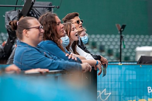 Daniel Crump / Winnipeg Free Press. Fans sing along to William Prince during the Unite Manitoba 150 celebrations at Shaw Park in downtown Winnipeg. August 28, 2021.