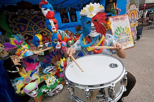 JOHN WOODS / WINNIPEG FREE PRESS
Kyle Neis Manitoba Association of Filipino Teachers, drums at the Bacolod Masskara Festival booth at the Manitoba Street Festival at the Philippine Canadian Centre of Manitoba in Winnipeg Sunday, August 29, 2021. 

Reporter: ?