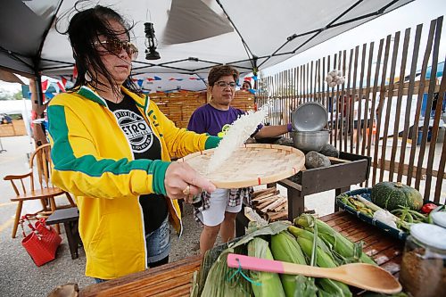 JOHN WOODS / WINNIPEG FREE PRESS
Women demonstrate traditional kitchen technics at the Manitoba Street Festival at the Philippine Canadian Centre of Manitoba in Winnipeg Sunday, August 29, 2021. 

Reporter: ?