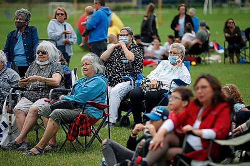 JOHN WOODS / WINNIPEG FREE PRESS
People take part in a community picnic to remember residents of Rooster Town at the former town site at the Pan Am Pool in Winnipeg Sunday, August 29, 2021.

Reporter: ?