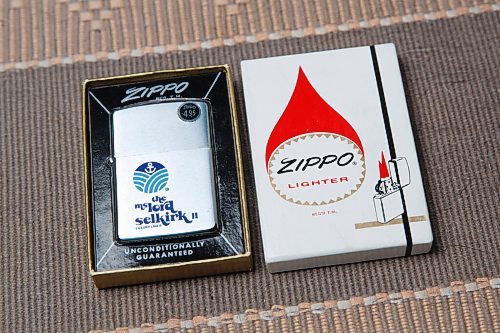 MIKE DEAL / WINNIPEG FREE PRESS
A zippo lighter new and unused in its original box, that has the M.S. Lord Selkirk II logo on it.
Craig Kraft, 61, has a modest collection of items associated with Winnipeg's riverboat era; postcards, buttons, boarding passes etc. from the various ships that used to parade up and down the Red, the River Rouge, Paddlewheel, Paddlewheel Princess etc.
See David Sanderson story
210831 - Tuesday, August 31, 2021.