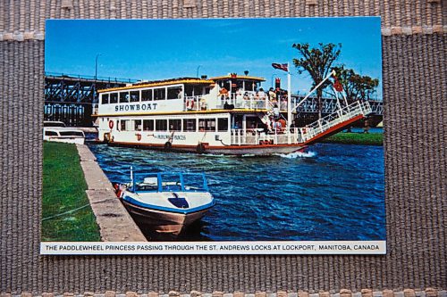 MIKE DEAL / WINNIPEG FREE PRESS
Paddlewheel Princess postcard
Craig Kraft, 61, has a modest collection of items associated with Winnipeg's riverboat era; postcards, buttons, boarding passes etc. from the various ships that used to parade up and down the Red, the River Rouge, Paddlewheel, Paddlewheel Princess etc.
See David Sanderson story
210831 - Tuesday, August 31, 2021.