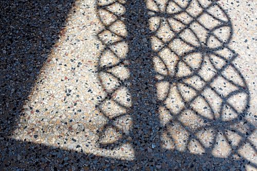 MIKE DEAL / WINNIPEG FREE PRESS
Decorative exposed aggregate floor catches shadows coming in through the front doors of The Gargoyle.
Author Andrew Davidson in the former Ellice Theatre, now The Gargoyle (585 Ellice Avenue) started work on the theatre before the pandemic, and now hes finally getting closer to opening up. 
See Ben Waldman story
210831 - Tuesday, August 31, 2021.