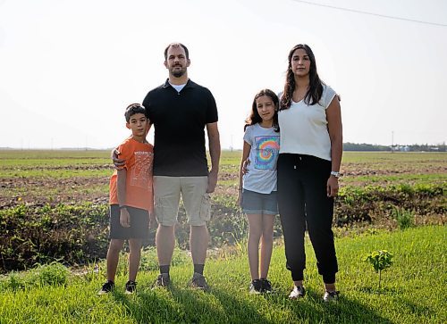 JESSICA LEE/WINNIPEG FREE PRESS

Matthew and Zabrina Cornelisse and their children Eliana, 10, second from right, and Micah, 8, left, pose for a photo near their home in Oakbank, Manitoba, on September 1, 2021. The Cornelisse family is nervous about going back to school since their childrens school division is allowing masks to not be worn when students are seated.

Reporter: Maggie Macintosh