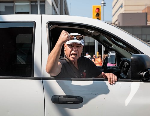 JESSICA LEE/WINNIPEG FREE PRESS

A man drives by an anti-vaccine protest on September 1st, 2021.

Hundreds gathered outside the Health Sciences Centre in Winnipeg, blocking off parts of Sherbrook Street and William Avenue to protest against vaccines, vaccine passports and COVID restrictions.

Reporter: Cody Sellar