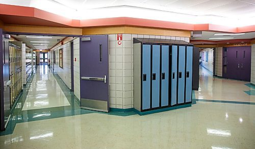 MIKE DEAL / WINNIPEG FREE PRESS
A hallway lined with what will probably be little used lockers at Ecole Julie-Riel.
See Maggie Macintosh story
210901 - Wednesday, September 01, 2021.