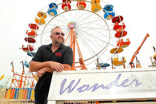 RUTH BONNEVILLE / WINNIPEG FREE PRESS

ENT -  Wonder Shows Wonder Shows Carnival 

Portrait of Wonder Shows manager, Ken Kiernicki,  with the Big Wheel behind hm at the Wonder Show grounds in Victoria Inn parking lot, 1808 Wellington Ave

Subject: Wonder Shows, a local traveling carnival, is back in business after nearly two years owing to the pandemic. They're set up at the Vic Inn until Monday and will be running rides at Boo at the Zoo in October. 


Eva Wasney

Sept 2nd,  2021
