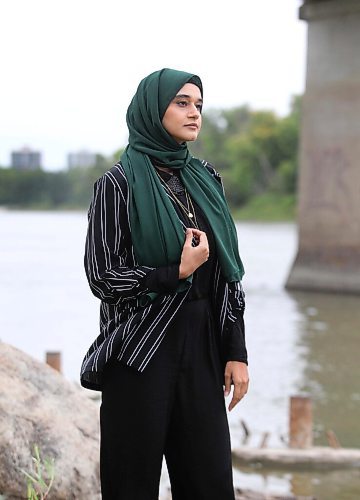 RUTH BONNEVILLE / WINNIPEG FREE PRESS

LOCAL - young afghans

Portrait of Rashedeh (she prefers to use first name only),  taken along the Assiniboine River near the park Thursday.

Story: for Melissa's feature about how young Afghan Canadians are responding to the crisis in Afghanistan. 

Sept 3rd,  2021
