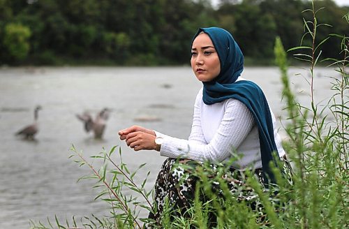 RUTH BONNEVILLE / WINNIPEG FREE PRESS

LOCAL - young afghans

Portrait of Zobaida Mohammed Hussaint aken along the Assiniboine River near the park Thursday. 

Story: for Melissa's feature about how young Afghan Canadians are responding to the crisis in Afghanistan. Zobaida is a young Hazara woman who spoke at Saturdays rally.


Sept 3rd,  2021
