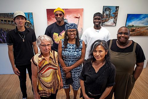 Daniel Crump / Winnipeg Free Press. (From top left) Emmanual Bongar, Naomi Gerrard, Tommyphyll, Judy Williams, Pajack Obeing, Phoebe Man, and Jibu Kamabu in the gallery at St. Norbert Art Centre. September 2, 2021.