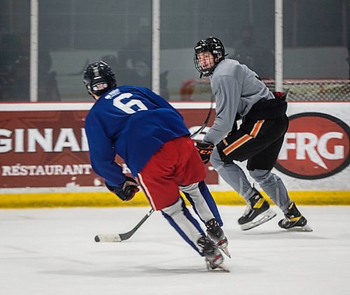 JESSICA LEE/Winnipeg Free Press

Ashton Cumby (3) skates after the puck at an ICE training camp on September 2, 2021

Reporter: Mike S.