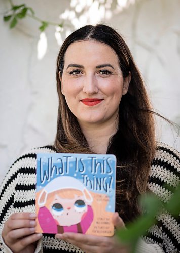JESSICA LEE/WINNIPEG FREE PRESS

Author Nia Schindle poses for a portrait at her home in Winnipeg, Manitoba, on September 3, 2021. During the pandemic, she self-published a childrens book about wearing a mask, inspired by her pandemic baby.

Reporter: Jen Zoratti
