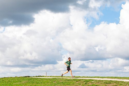 Daniel Crump / Winnipeg Free Press. A person runs laps at Westview Park Saturday afternoon. September 4, 2021.