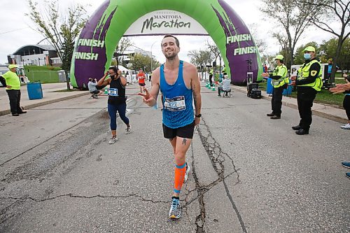 JOHN WOODS / WINNIPEG FREE PRESS
Tom Sherwin one of the first men crosses the marathon finish line at the Manitoba Marathon at the University of Manitoba in Winnipeg Sunday, September 5, 2021. 
Reporter: ?