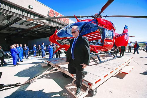 MIKE DEAL / WINNIPEG FREE PRESS
Premier Kelvin Goertzen checks out the new STARS Airbus H145 helicopter at its base at the Winnipeg Airport Monday morning. 
210907 - Monday, September 7, 2021