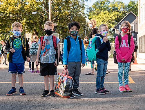 JESSICA LEE/WINNIPEG FREE PRESS

Students line up for the first day of school at Glenelm Community School on September 8, 2021.

Reporter: Maggie