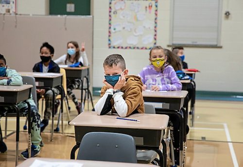 JESSICA LEE/WINNIPEG FREE PRESS

Students sit in class on the first day of school at Glenelm Community School on September 8, 2021.

Reporter: Maggie