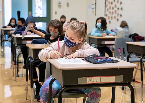 JESSICA LEE/WINNIPEG FREE PRESS

Students sit in class on the first day of school at Glenelm Community School on September 8, 2021.

Reporter: Maggie