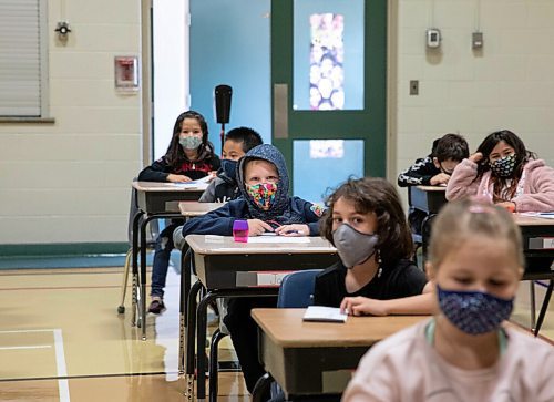 JESSICA LEE/WINNIPEG FREE PRESS

Students sit in class on the first day of school at Glenelm Community School on September 8, 2021.

Reporter: Maggie