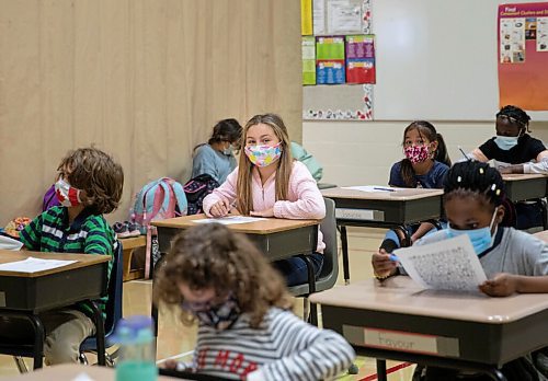 JESSICA LEE/WINNIPEG FREE PRESS

Natalie Fernandez, 10, in pink, is in grade 5 this year. She sits in class with her classmates at Glenelm Community School on September 8, 2021.

Reporter: Maggie