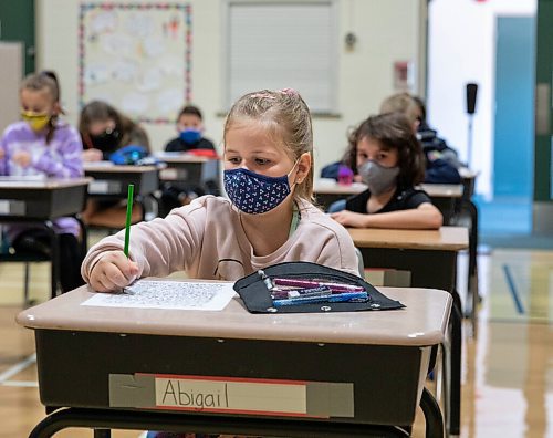 JESSICA LEE/WINNIPEG FREE PRESS

Students sit in class on the first day of school at Glenelm Community School on September 8, 2021.

Reporter: Maggie