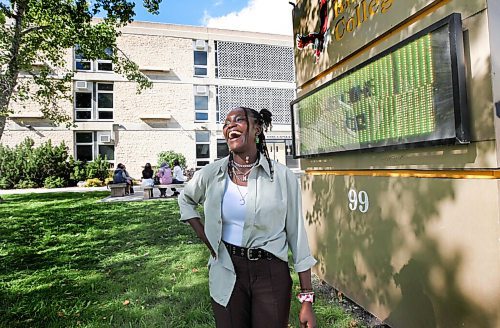 RUTH BONNEVILLE / WINNIPEG FREE PRESS

LOCAL - FRC school return

Grade 12 student, Tinu Tope - Awofeko, can't hold back her excitement pf going to in-person classes again.  She had fun in her great back-to-school outfit that she picked out with her family and a large grin ear to ear as she was photographed outside Fort Richmond Collegiate at the end of her 1st day of school Wednesday.

Sept 8th,  2021
