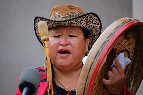 MIKE DEAL / WINNIPEG FREE PRESS
Ally Cox from the Red Robe Womens Drum Society performs the Honour Song for around 100 guests who joined Mayor Brian Bowman and representatives from 38 new Accord partners at City Hall to take part in the signing ceremony for Winnipegs Indigenous Accord Thursday morning.
210909 - Thursday, September 09, 2021.