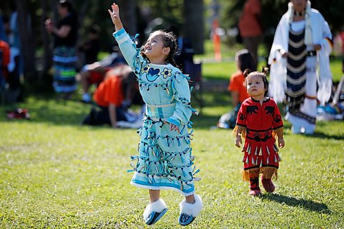 JOHN WOODS / WINNIPEG FREE PRESS
Children chase a dragonfly at an Every Child Matters powwow at Vimy Ridge Park in Winnipeg Sunday, September 12, 2021. 

Reporter: May