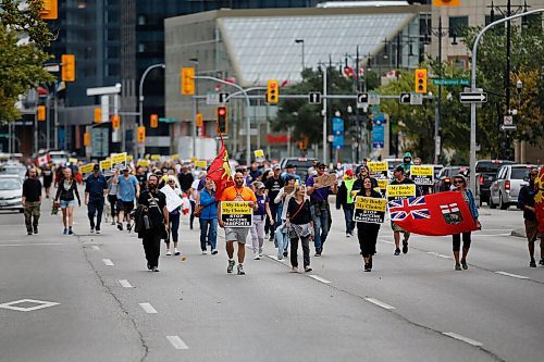 JOHN WOODS / WINNIPEG FREE PRESS
About 150 anti-maskers/vaxxers gathered at the MB Legislature and walked to the City Hall in protest against COVID-19 vaccinations and masks in Winnipeg Monday, September 13, 2021. 

Reporter: Silva