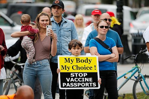 JOHN WOODS / WINNIPEG FREE PRESS
People listen to a speaker at city hall. About 150 anti-maskers/vaxxers gathered at the MB Legislature and walked to the City Hall in protest against COVID-19 vaccinations and masks in Winnipeg Monday, September 13, 2021. 

Reporter: Silva