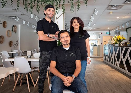 JESSICA LEE/WINNIPEG FREE PRESS

Zaytoon is a Middle Eastern restaurant located in Osborne Village in Winnipeg. The restaurant serves traditional Middle Eastern food with a twist - on the menu are Arabic twist tacos, which are tacos filled with shawarma meat.

From left to right: Mohammad Watan (cook), Huthaifa Alomari (barista) and Bassma Zahran (cook).

Reporter: Eva