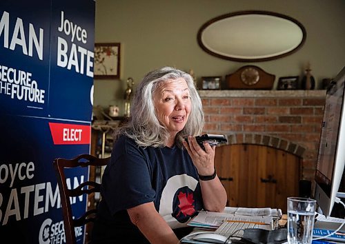 JESSICA LEE/WINNIPEG FREE PRESS

Joyce Bateman, Conservative candidate for Winnipeg South Centre, calls constituents from her home office on September 14, 2021. She has an interesting display of election signs set up behind her, for virtual debates.