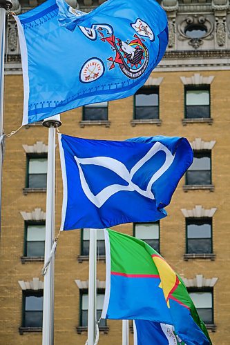 MIKE DEAL / WINNIPEG FREE PRESS
Three flags representing Treaty One First Nations, Dakota Nations, and the Métis Nation were raised at City Hall Wednesday morning and will be flying permanently as part of an ongoing commitment to reconciliation. 
210915 - Wednesday, September 15, 2021.