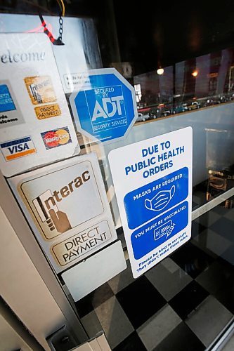 JOHN WOODS / WINNIPEG FREE PRESS
Mask signage at Twisters, a local business in Winkler, Wednesday, September 15, 2021. Many in southern Manitoba region do not agree with COVID-19 vaccines, masks and vaccine passports.

Reporter: Abas