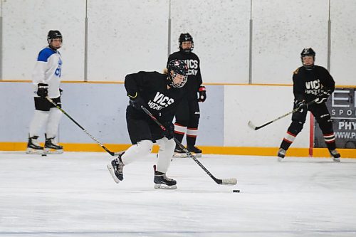 MIKE DEAL / WINNIPEG FREE PRESS
Students tryout for the College Jeanne-Sauve varsity girls hockey team at the Dakota Community Centre Thursday morning.
See Mike Sawatzky story
210916 - Thursday, September 16, 2021.