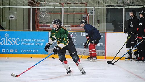 MIKE DEAL / WINNIPEG FREE PRESS
Students tryout for the College Jeanne-Sauve varsity girls hockey team at the Dakota Community Centre Thursday morning.
See Mike Sawatzky story
210916 - Thursday, September 16, 2021.