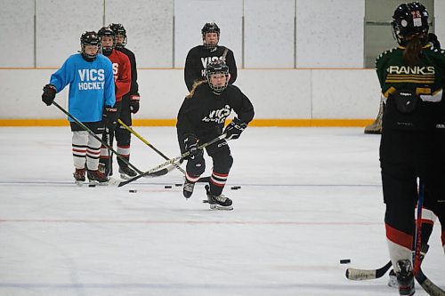 MIKE DEAL / WINNIPEG FREE PRESS
Students tryout for the College Jeanne-Sauve varsity girls hockey team at the Dakota Community Centre Thursday morning.
See Mike Sawatzky story
210916 - Thursday, September 16, 2021.