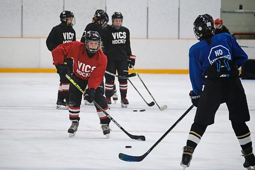 MIKE DEAL / WINNIPEG FREE PRESS
Students tryout for the College Jeanne-Sauve varsity girls hockey team at the Dakota Community Centre Thursday morning.
See Mike Sawatzky story
210916 - Thursday, September 16, 2021.