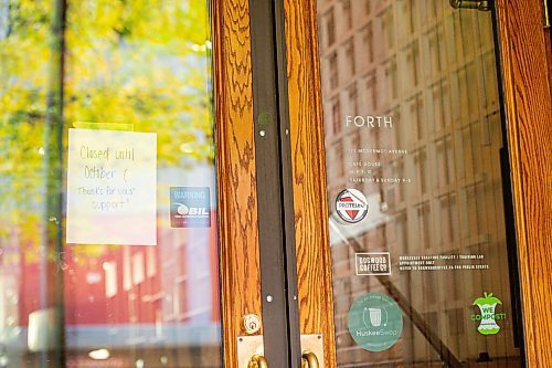 MIKE SUDOMA / Winnipeg Free Press
A closed sign stuck to the inside of the front doors to Forth Coffee Shop Friday afternoon.
September 17, 2021