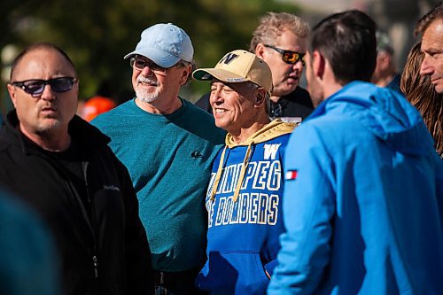 Daniel Crump / Winnipeg Free Press. Former Manitoba Conservative candidate Ken Lee poses with supports during an anti-vaccine rally at the Manitoba Legislature. September 18, 2021.