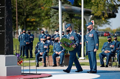 JOHN WOODS / WINNIPEG FREE PRESS
Major General Kenny, Canadian Air Division, places a wreath as other military personnel look on at a ceremony marking the 81st anniversary of the Battle of Britain at 17 Wings Garden of Memories in Winnipeg Sunday, September 19, 2021. 

Reporter: ?