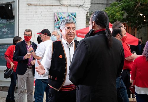 JESSICA LEE/WINNIPEG FREE PRESS

Liberal candidate Andrew Carrier chats with Grand Chief Garrison Settee at a campaign stop in Winnipeg at The Blue Note Park on Main Street on September 19, 2021.

Reporter: Danielle

