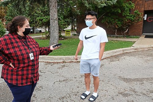 MIKE DEAL / WINNIPEG FREE PRESS
Ryan Tieu chats about his voting experience outside the poll at the Winnipeg Conservatory of Music at 1476 Portage Ave, Monday morning to vote in the Federal Election. 
210920 - Monday, September 20, 2021