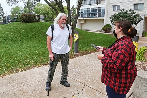 MIKE DEAL / WINNIPEG FREE PRESS
David Morrice chats about his voting experience outside the poll at the Tuxedo Towers at 1975 Corydon Ave, Monday morning to vote in the Federal Election. 
210920 - Monday, September 20, 2021