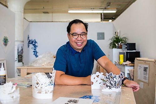 MIKAELA MACKENZIE / WINNIPEG FREE PRESS

Paul Robles, one of the artists creating an installation for Nuit Blanche this year, poses for a portrait in his studio in Winnipeg on Monday, Sept. 20, 2021. His piece, which includes monkey figures and inflatable structures, will be located in Old Market Square. For Eva story.
Winnipeg Free Press 2021.