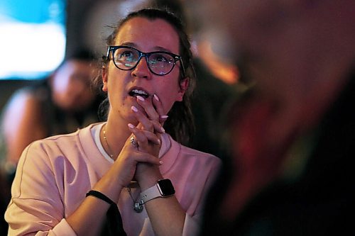 JOHN WOODS / WINNIPEG FREE PRESS 
A supporter of Doug Eyolfson, Liberal candidate in Charleswood-St James-Assiniboia-Headingley, during a party at their restaurant location, the Cork and Flame on Portage Avenue, in Winnipeg Monday, September 20, 2021. 

Reporter: Katie